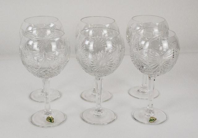6 Waterford Millennium Cut Glass Wine or Toasting: Set of six cut glass wine or toasting glasses from Millennium Collection by Waterford, each 8"H, includes: Two in "Happiness" pattern, both signed "Eugene Young 7-12-2001" and with acid-etch Waterford