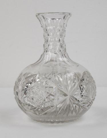 H. P. Sinclaire Brilliant Cut Glass Carafe: Neck having facet-cuts with cut-panels above at rim and below at shoulder, body with hobstar and alternating fan motif, ray-cut base, marked with "S" in wreath, first quarter 20th century; 7 1/2"H; go