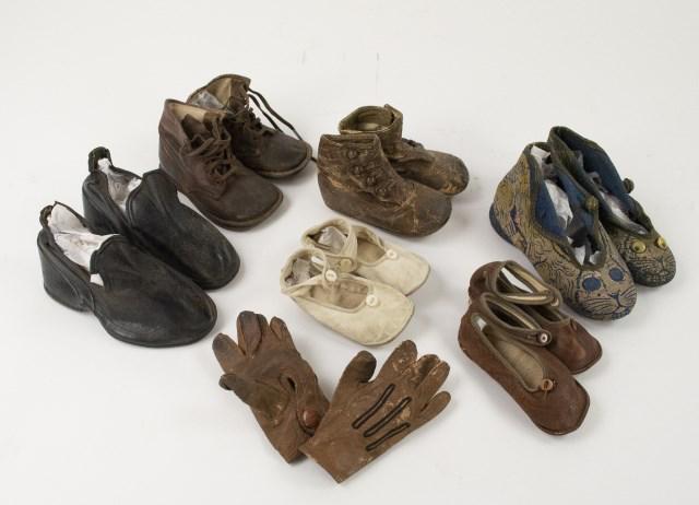 Late 19th/Early 20th C. Children's Shoes, Gloves: Six pairs of children's shoes including four pairs of leather, one pair of cloth and felt and one pair marked "Rhode Island Rubber Co."---One pair of children's leather gloves---all with signs of wear
