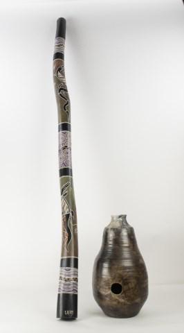 Artist Signed 64"L Didgeridoo & Pottery Udu Drum: 1. Large wooden didgeridoo hand painted with various animals and painted dot designs, signed at lower edge "L. Alfred"; 64"L---2. Pottery udu drum or percussion pot, incised decoration around neck and