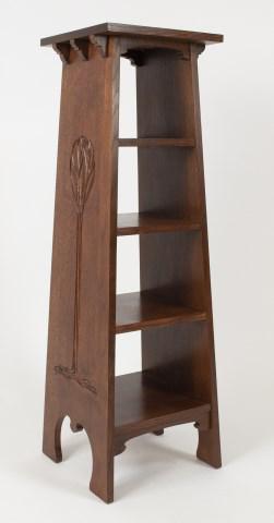 Stickley Audi Tree of Life Oak Magazine Stand: No. 89-504, four fixed shelves, hand carved Tree of Life motif on each side, branded mark and metal tag; 14"W, 13 1/2"D, 43 3/4"H; good condition with minor abrasions commensurate with use (Ref. 123)
