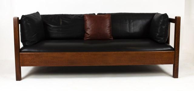 Stickley Audi Arts & Crafts Style Oak Settle: Match to previous lot, Harvey Ellis Arts & Crafts style settle having inlay accents on side and back panels, black leather seat and cushions, branded mark and metal tag; 76 3/4"W, 32"D, 30"H; good con