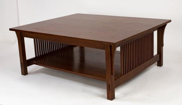 Stickley Audi Arts & Crafts Style Cocktail Table: No. 89-767, oak cocktail or coffee table having a rectangular top over lower shelf, spindle sides, branded mark and metal tag; 36"L, 44"W, 17"H; good condition with minor abrasions commensurate with u