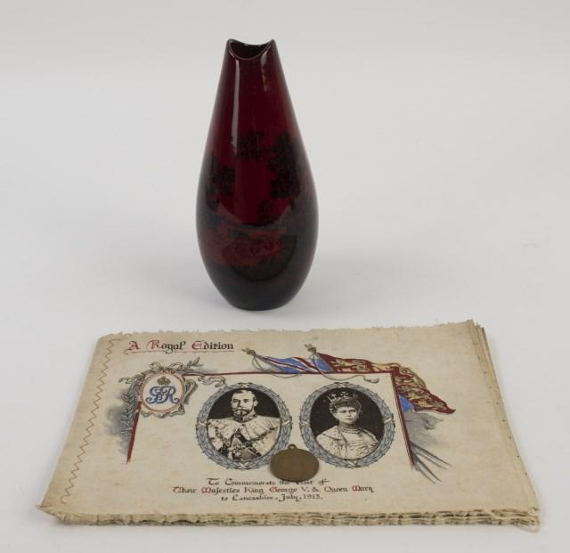 Royal Doulton-Raphael Tuck-1902 Medal: Three British items: 1. Royal Doulton Flambe Woodcut 1613 vase, depicting a landscape scene with farmers and horses, marked on base; 6 5/8"H; good condition---2. Raphael Tuck & Sons cloth children's b