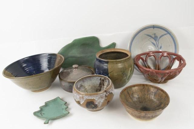 Lot of 9 Studio Pottery Bowls, Jars & Trays: Nine pieces: 1. Fish shaped tray with green glaze, base with unknown mark; 15"L, 8"H---2. Small tray shaped as a tree with a sprig of holly, green glaze, base with illegible signature; 6 1/2"L, 5 3/4"