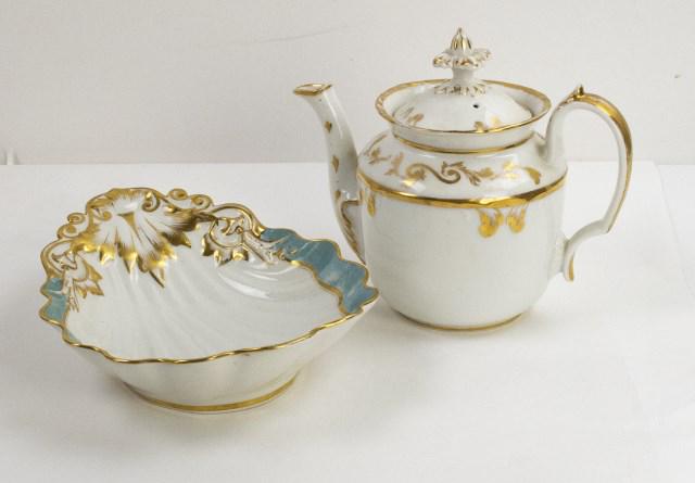 Old Paris Porcelain Teapot & Shell Form Dish: 1. Old Paris porcelain teapot, 19th century, waisted barrel form with flared rim and inset lid having foliate finial, white with gilt scrolls and accents, base marked with incised "Z" or "2"; 9 1/4"W,