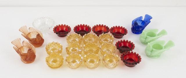 Lot of Glass Open Salt Cellars or Nut Dishes: 23 pieces including: 1. One Heisey #1535 Diamond or #7018 Oval in Diamond Point, Heisey mark in base; 2 5/8" dia., 1"H---2. Set of six ruby Candlewick; 2 1/8" dia., 7/8"H---3. Set of five Degenhart gl