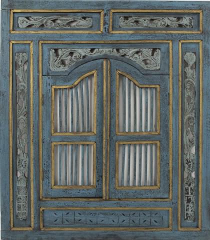 Indonesian Carved & Painted Wood Framed Mirror: Blue and gilt painted wood frame having panels of openwork carvings, two hinged arched doors with spindle dowels open to interior with mirror; 31 1/2"W, 35 3/4"H, 1 1/8"D; mirror needs replacing (Ref.