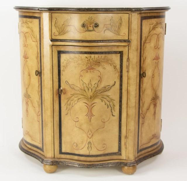 Italian Painted Commode: Serpentine form, front with drawer over door and flanked by cabinet door on each side, case painted with elaborate scrolls and foliate designs, 20th century; 33 3/4"W, 15 1/2"D, 34"H; good condition,