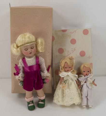 3 Dolls--Nancy Ann Storybook & Vogue Ginny: 1. Nancy Ann Storybook Flower Girl, No. 85 Bridal Series, wearing original costume and in original box; approx. 4 1/2"H---2. Nancy Ann Storybook Ring Bearer, No. 84 Bridal Series, wearing original cos