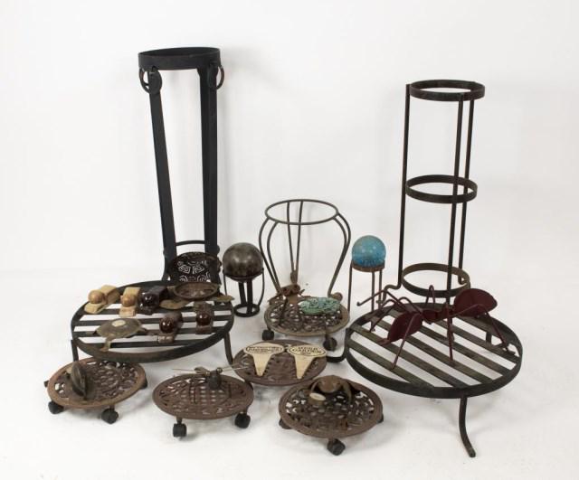 Large Grouping of Patio and Garden Items: 1. Iron plant stand; 12"W, 32"H---2. Iron plant stand; 13 1/2"W, 28 1/2"H---3. Two large round iron trivet plant stands, each supported on three curved legs; top 18" dia., legs 22 1/2"W---4. Five 10"
