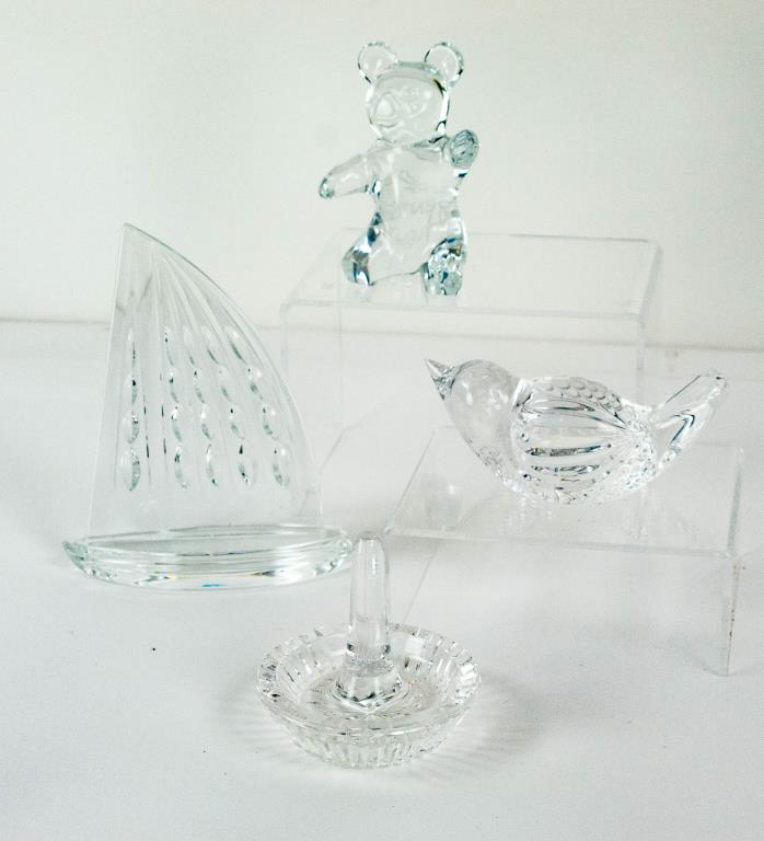 4 Pcs. Waterford & Daum France Crystal: Three pieces of signed Waterford crystal including: Ring holder; 3"H; 3 1/8"W; Sailboat; 4 3/4"W, 5 5/8"H; Bird paperweight; 4 1/2"L, 1 7/8"H---Daum France crystal bear, etched inscription on back "Ma