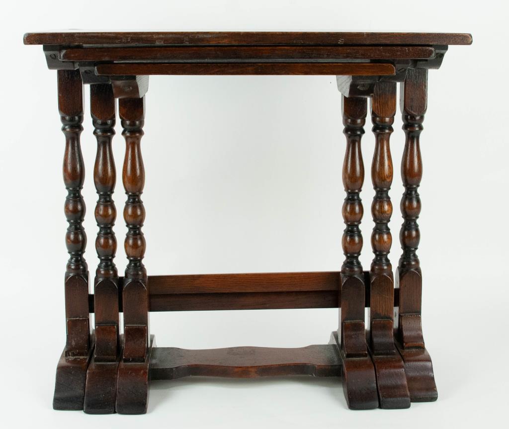 Nest of Three English Oak Tables: Rectangular tops, trestle base with turned legs, old label on base for Livingston & Sons Antiques, Charleston; largest 20 1/2" x 12:, 18 1/4"H---Dr. Jeffrey Willis Estate, Spartanburg, SC (Ref. 124)