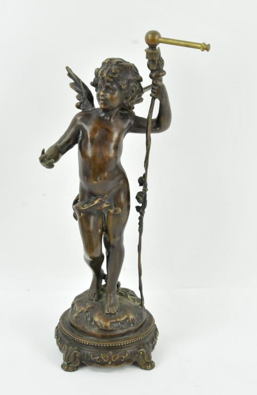 After Auguste Moreau, Bronze Sculpture of Cupid: A. La Plus Belle after Auguste Moreau (French, 1834-1917), back marked in mold "France / (fleur de lis) / Paris" within a circle and with impressed signature "Aug. Moreau"; 17 5/8"H (Ref. 93)
