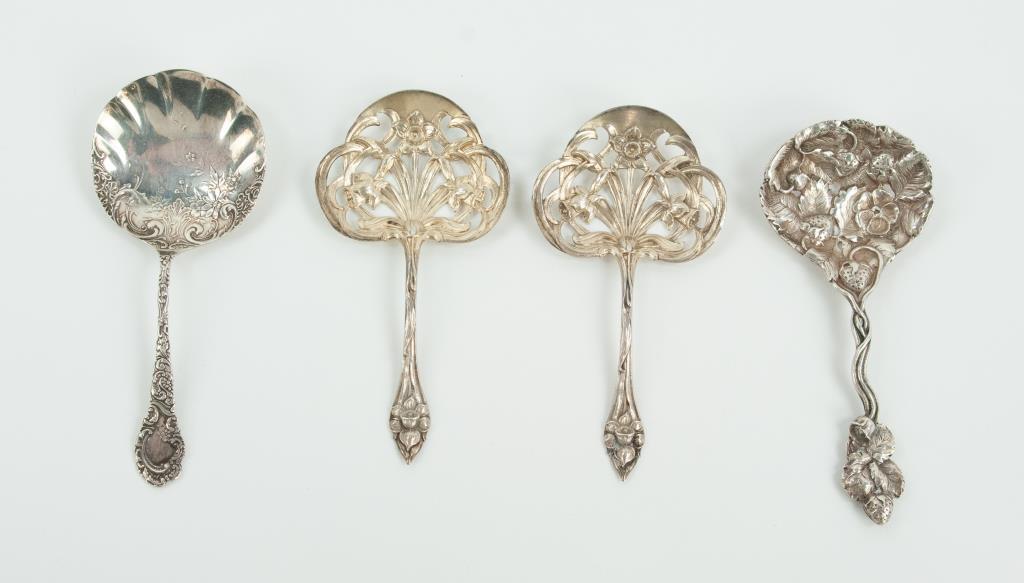 Four Ornate Sterling Silver Bonbon Spoons: No monograms: 1. Matching pair of Gorham H45 Art Nouveau bonbon spoons with pierced bowls, handle and bowl with floral decoration, each marked "Lion / Anchor / G Sterling H45"; 4 1/2"L---2. Art Nouvea