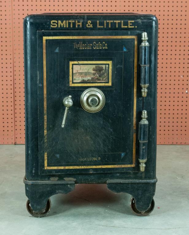 Mosler Antique Steel Safe: The Mosler Safe Company, Hamilton, Ohio; door decorated with handpainted landscape and striping, on wheels, late 19th / early 20th century; 21 1/4"W, 22 1/2"D, 31 3/4"H; normal wear and loss to paint