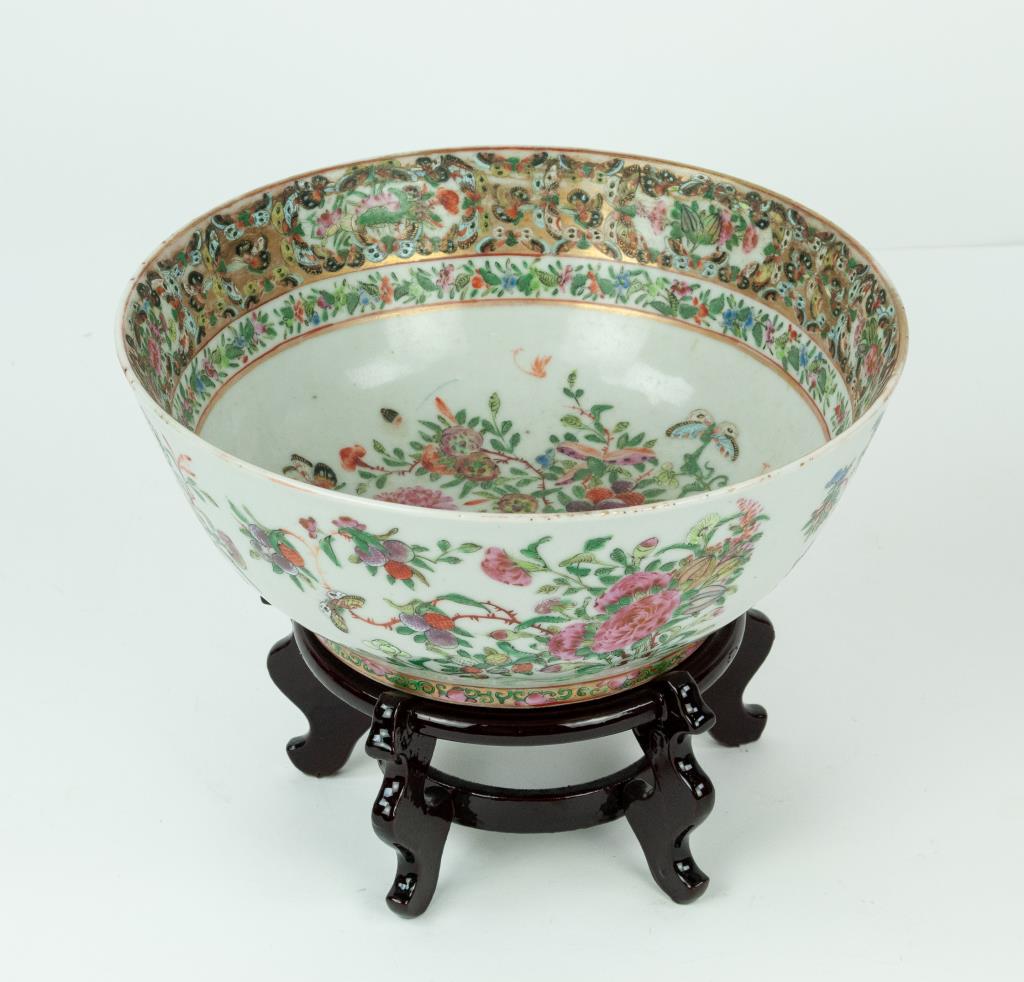 Chinese Export Famille Rose Punch Bowl: Chinese export famille rose porcelain punch bowl, Interior and exterior having polychrome painted floral and fruit sprays and butterflies, 19th century; 10 7/8" dia., 4 1/2"H; good condition---Dr. Jef