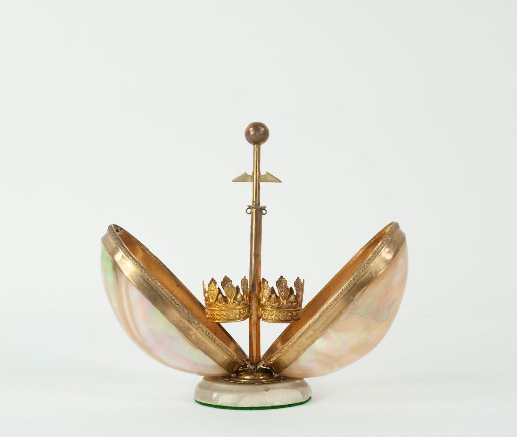 Mother of Pearl Oyster Form Perfume Box: Spring loaded ball finial pushes down to open shell in half and reveal two crown form holders for perfume bottles, stepped oval alabaster base; 6 1/4"H; no perfume bottles, one side with repair to she