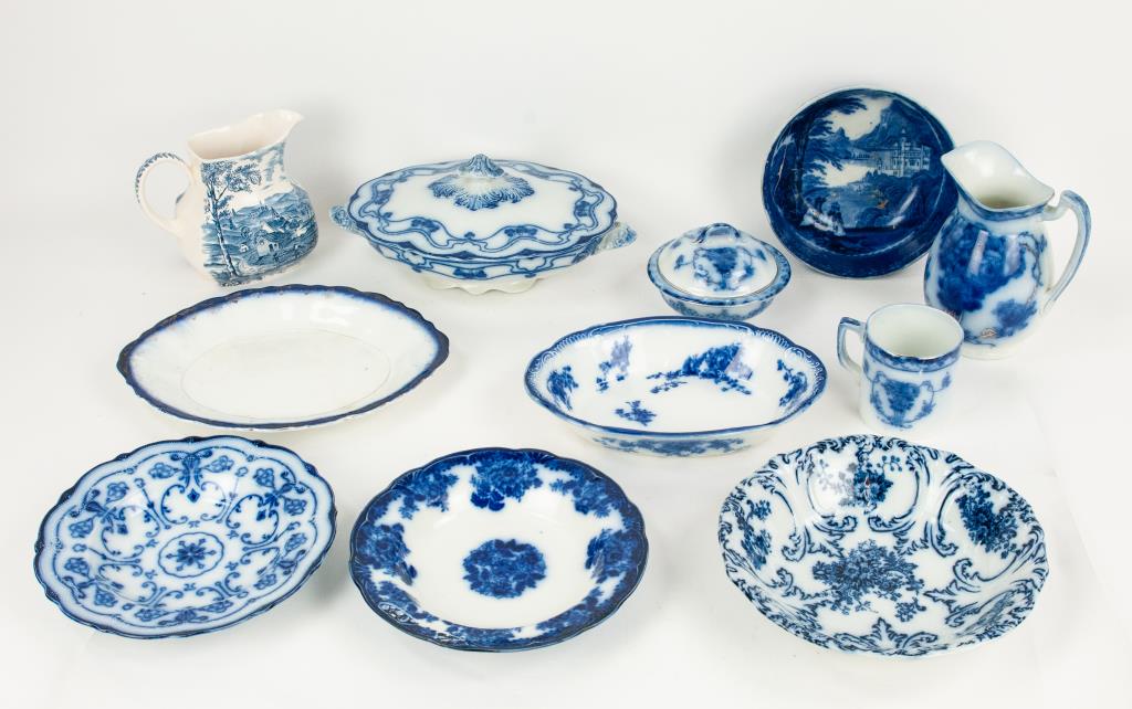 Lot of Flow Blue & Transferware Pitcher: Covered vegetable with handles in Paris pattern by Stanley Pottery; very small flea bite to inner edge of rim on lid---7"H pitcher, unmarked---Soap dish, unmarked, lid possibly a replacement---9" soup