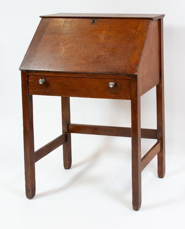 Early 20th C. Oak Larkin's Desk: Slant top over one long drawer, fitted interior with drawer and cubbyholes; 29 1/2"W, 41 1/2"H; 16"D closed, 28 3/4"D open; stains, losses to finish, missing escutcheon, replaced hardware (Ref. 731)