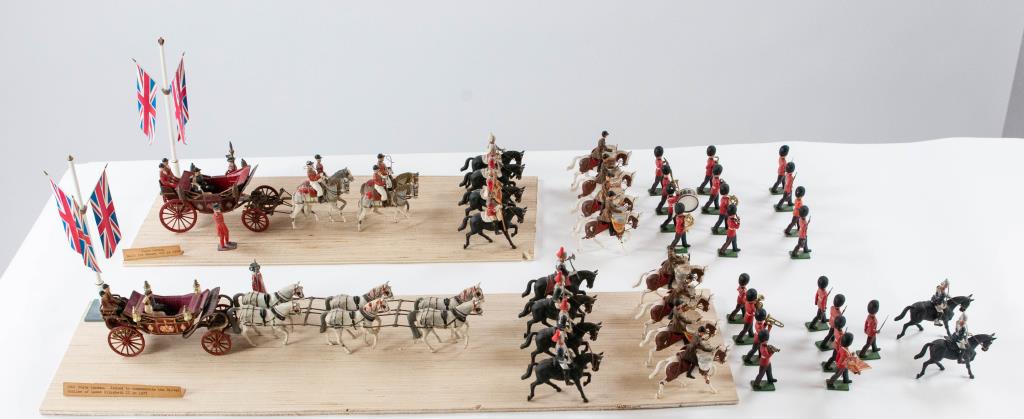 Two 1902 State Landaus, Lead & Plastic Toy Figure: 1902 metal State Landau pulled by four Britains lead horses and Corgi 1902 plastic State Landau pulled by six Britains lead horses, includes one Britain's lead beefeater, two unmarked lead beefeaters,