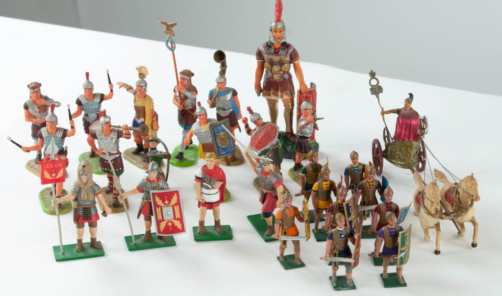 Lead Roman Chariot & Soldiers, Elastolin Soldiers: 25 figures: Lead two-horse chariot; 6 1/4"L; Nine Roman lead soldiers on foot; 2 1/4"H; Ten Elastolin soldiers on foot; One Starlux soldier kneeling; Four "Blue Box, Made in China", soldiers on foot; 