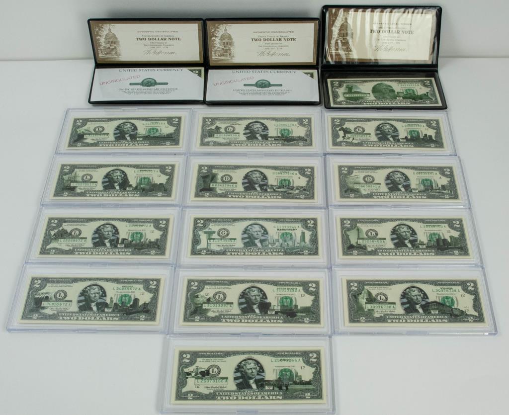 16 Uncirculated $2 Notes, Most w/ State Overprints: (2) United States Monetary Exchange $2 Uncirculated Notes, in original plastic folding binder---(1) World Reserve Monetary Exchange $2 Note with South Carolina overprint, in original plastic foldingbi