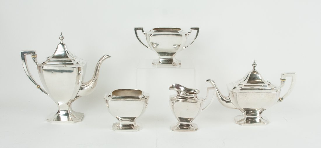 5-Piece Saart Bros. / SSMC Sterling Tea Set: Five-piece sterling coffee and tea service, Pattern No. 0712; including teapot and coffee pot with ivory colored insulators, sugar bowl, creamer and waste bowl; all pieces marked "SSMC Sterling" and "