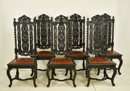 Set of Six Mid 19th C. Renaissance Revival Chairs: Match to preceding and following lots---Set of six oak chairs, each with pierced and heavily carved crest and back, acorn finials, barley twist supports, floral and scrolled medallions, trapezoidal se