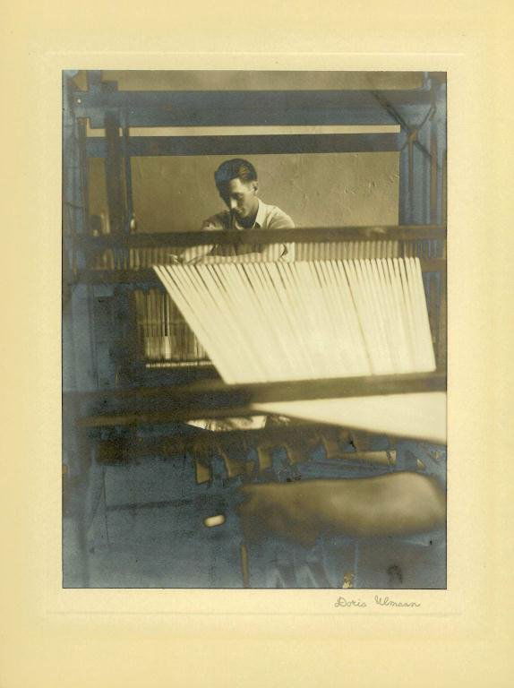 Doris Ulmann Photograph Platinum print Mountain Wea: Doris Ulmann Photograph Platinum print Mountain Weavers; front view of young man at loom, Berea, Kentucky, signed in black ink lower right mount "Doris Ulmann" (1882-1934), 8 x 6 in., framed in 14 x 1