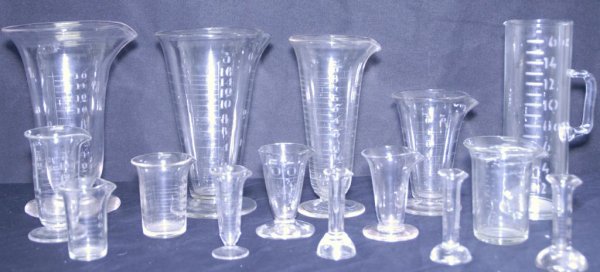Lot of Blown Glass Pharmaceutical Lab Beakers Lot : Lot of Blown Glass Pharmaceutical Lab Beakers Lot of 15 blown glass pharmaceutical lab beakers in varying shapes and sizes; three marked Whitall Tatum Company, one marked W. T. & Co., one marked with 
