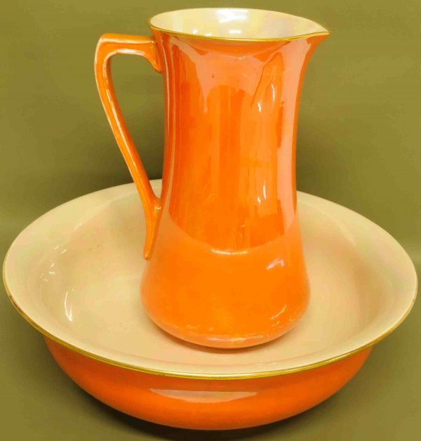 Carlton Ware Wash Basin & Pitcher Bright orange wa: Carlton Ware Wash Basin & Pitcher Bright orange wash basin and matching pitcher with opalescent interiors and gold trim; each piece having the W&R Carlton Ware mark in use from 1894-1927; pitcher 12 5