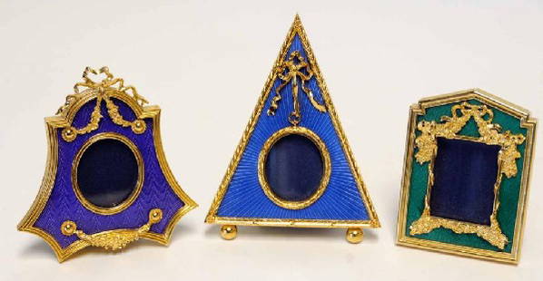 Three Kitney & Co., London, Mini Enameled Frames: Three mini frames handcrafted in jewel toned enamel and accented with gilt garlands, rosettes, and bows; original satin lined case accompanies each frame; 3 3/4"W, 5"H; 3 3/4"W, 4"H; 2 5/8"W, 3 