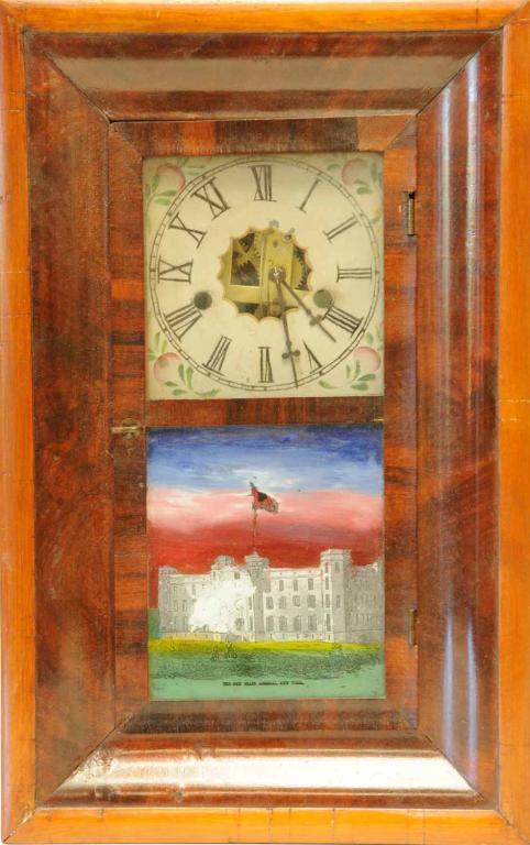 New Haven Clock Company Ogee Shelf Clock: Mahogany with reverse painting depicting "The New State Arsenal, New York"; two paper labels--"New Haven Clock Co., New Haven, Ct." and "S. R. Stibgen, Dealer in Clocks, Watches, Jewelry, Silver Ware,
