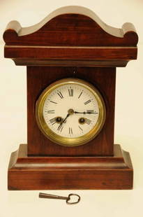 Small French Shelf Clock: Walnut case with brass works; c. 1880; retains original key; 11 1/4"H, 8"W, 3"D