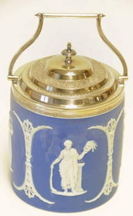 Wedgwood Medium Blue Jasper Dip Biscuit Jar: Classical decoration in white relief on blue field; silverplated mounts; impressed mark; 9" including handle