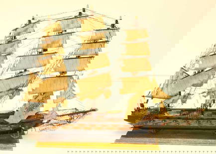 "Fragata Espanola" Wooden Ship Model: Three-masted ship with figurehead and 17 cannons on each side; main sail with painted double-headed eagle; two lifeboats, one resting on the rear starboard and one atop the cabin; anchors each 