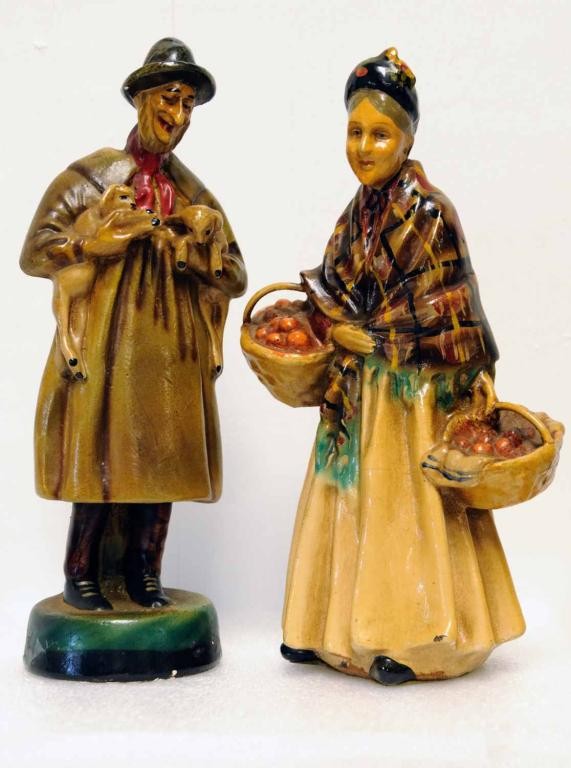 Pair of Painted Chalkware Figures: Woman carrying baskets laden with food; man carrying two small lambs; Roman Art Co., Robia Ware; 9" and 9 1/4"H; original label on base of woman; minor paint loss