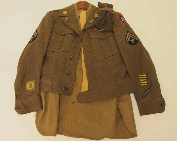 WWII Complete Army Uniform: Jacket, shirt, slacks, cap, belt; olive drab wool; jacket with patches, pins, and bars including 5th Army (A5) patch on left sleeve, Technician 5th Grade Chevron each sleeve, one service stripe left a