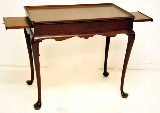 Queen Anne Style Tea Table: Tray top with shaped corners; cabriole legs; each end fitted with a pull-out candle slide; 20th century; 29 1/4" x 18", 26 1/2"H--From the living estate of Dr. Clark Collins, Greenville, South Carolin