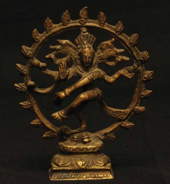 Shiva Nataraja Bronze Figure: Shiva Nataraja, deity of dance, encircled by flame and performing dance of bliss, right foot upon the dwarf demon of ignorance and indolence, supported by a lotus throne on stepped base; 5 1/2"H; 4 1/