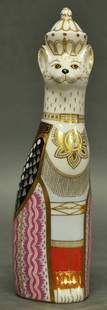 Royal Crown Derby 'Burmese Royal Cat Figure': Burmese' from the series 'Royal Cats'; cat sitting with robe and crown; decorated in gold, black, pink and coral; dated 1988; 8 3/4"H