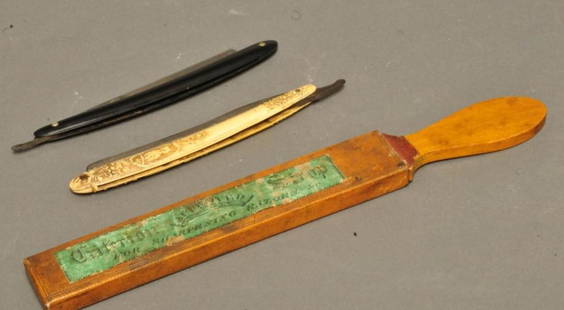 Two Straight Razors and Strop: 1. Straight razor with intricately carved celluloid handle featuring Classical and Art Nouveau motifs with a central owl medallion; maker incised on steel "LM & Sons Razor"; 2. Straight razor