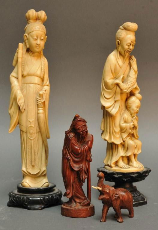 Two Faux Ivory Statues & Two Wood Carvings: 1. Faux ivory statue of female figure; 13"H; 2. Faux ivory statue of male figures; 12 1/4"H; 3. Wood carving of scholar; 6 1/2"H; losses to top of staff and top of head; 4. Wood carving of elephant; 3