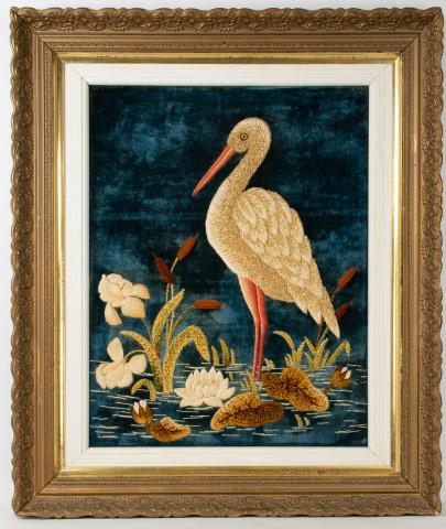 Tufted Needlework of a Crane: Depicting a crane standing in water with cattails, water lily and other wetland flora; gilt wood frame; probably late 19th / early 20th century; sight 22 1/2"W, 28 1/2"H; frame 33 1/4"W, 39 3/4"H (Ref