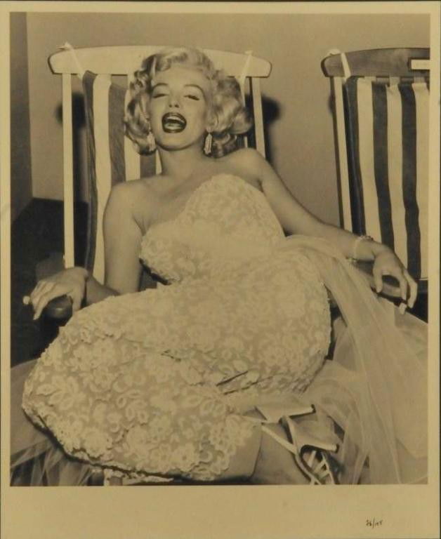 Marilyn Monroe Photo by Frank Worth (1923-2000): Limited edition black and white photograph of Marilyn Monroe in lounge chair; photograph was taken by noted Hollywood photographer, Frank Worth, and published posthumously in 2004; bears "FW Estate" b