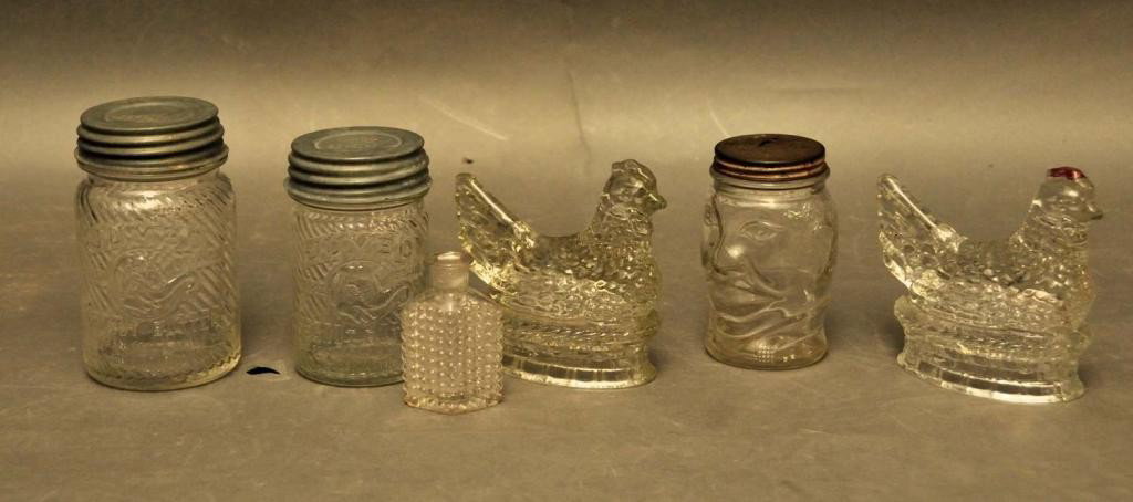 Six Vintage Glass Items: 1. Diamond shaped and textured clear poison bottle, 3"H; 2. Two chicken on the nest candy containers; 3. Jumbo Brand Peanut Butter jar, 10 1/2 oz.; 4. Jumbo Brand Peanut Butter jar, 1 lb.; 5. Lucky Jo