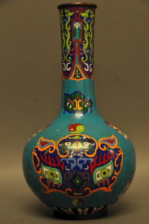Tall Oriental Cloissone Vase: Long neck opening to bulbous body; decorated with stylized bats of various sizes and with Yin and Yang symbols; 15 3/4"H