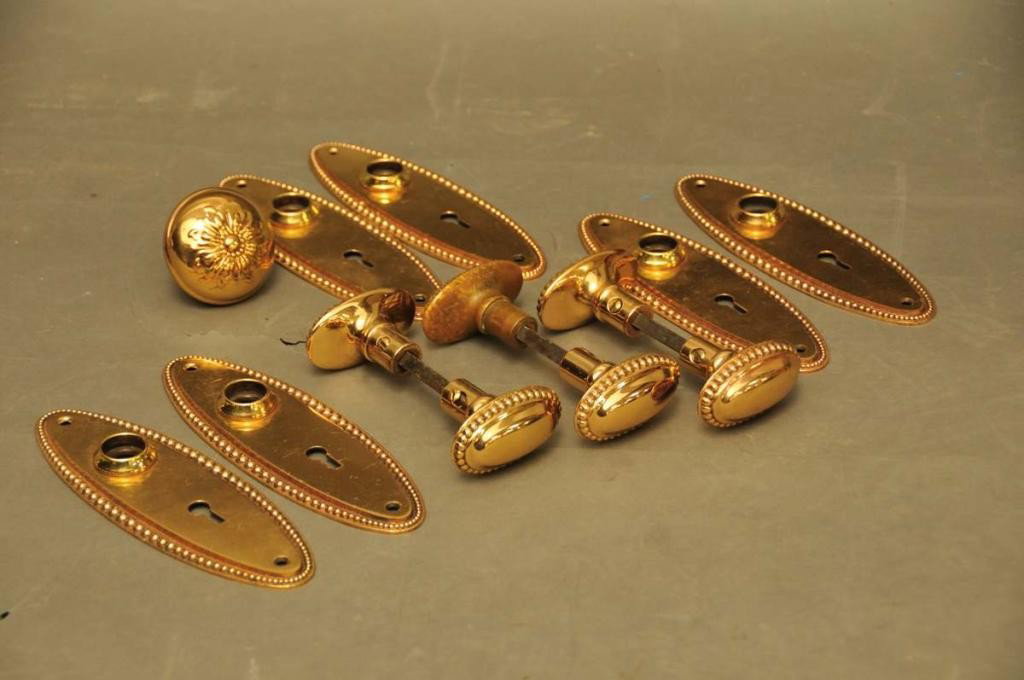 3 Sets of Antique Copper Doorknobs/Backplates: Three sets of "Edgemont" beaded copper doorknobs with matching backplates by Reading Hardware Co., Reading, PA; late 19th/early 20th century; backplates 2 1/4"W, 7"L; lot also includes one round doork
