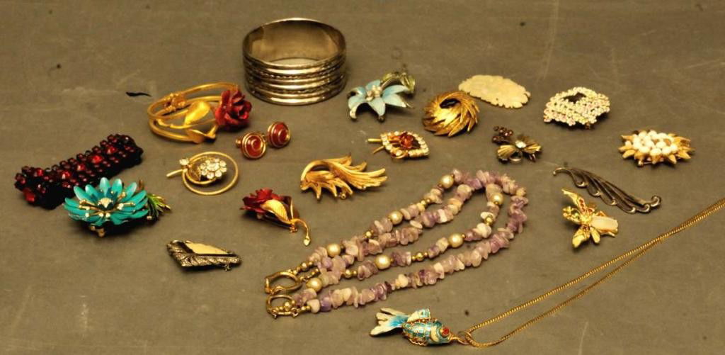 20 Pieces of Costume Jewelry: Including: Goldtone bracelet and brooch set with red rose, signed Cerrito; three signed Trifari brooches; two signed Coro brooches; one signed ART brooch with rhinestones; signed Sandra David polished